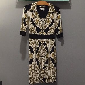 Very pretty dress in black and gold